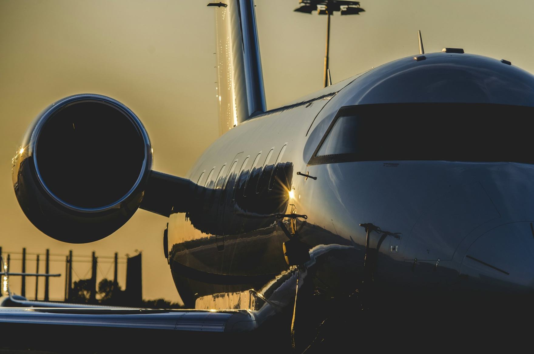 Engine nacelle and fuselage of a narrowbody airliner inside a maintenance hangar